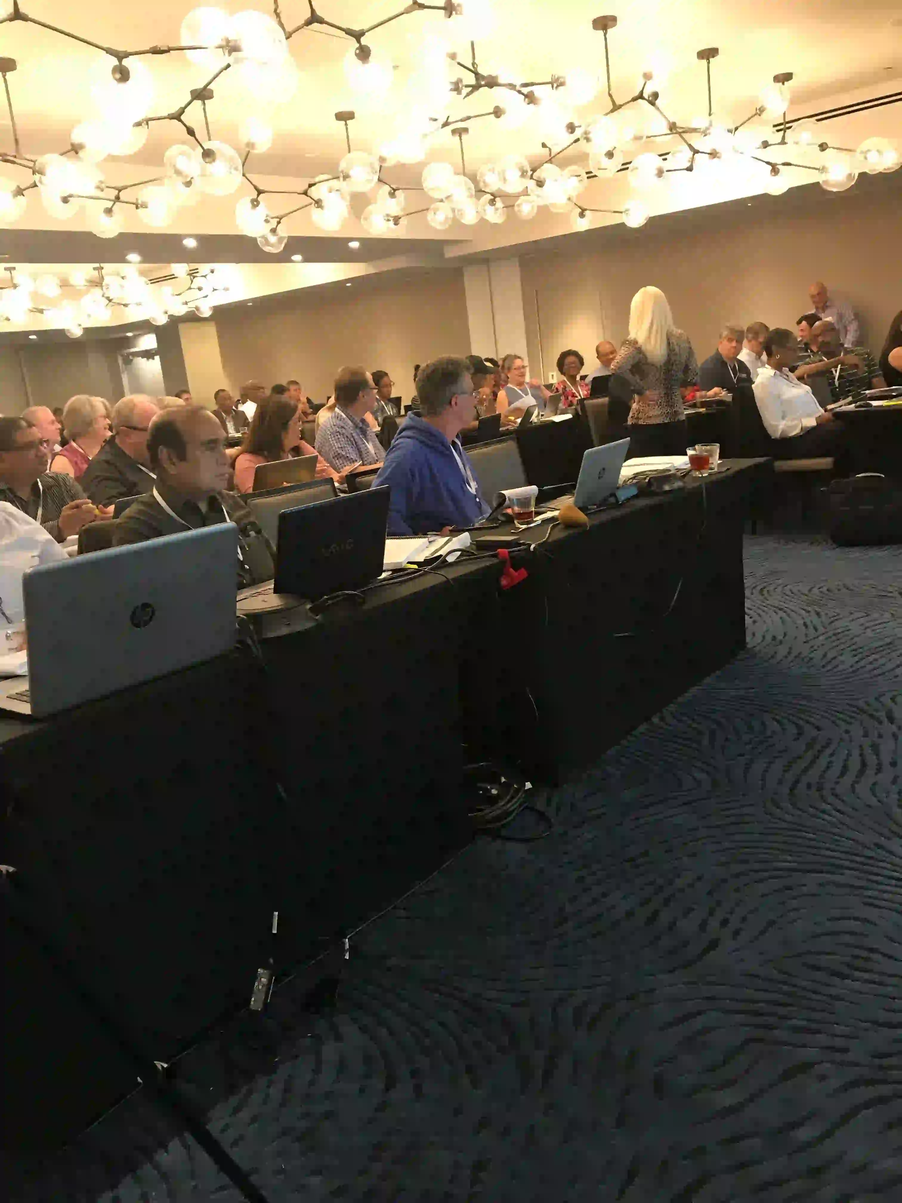 Several pictures of previous tax resolution conferences