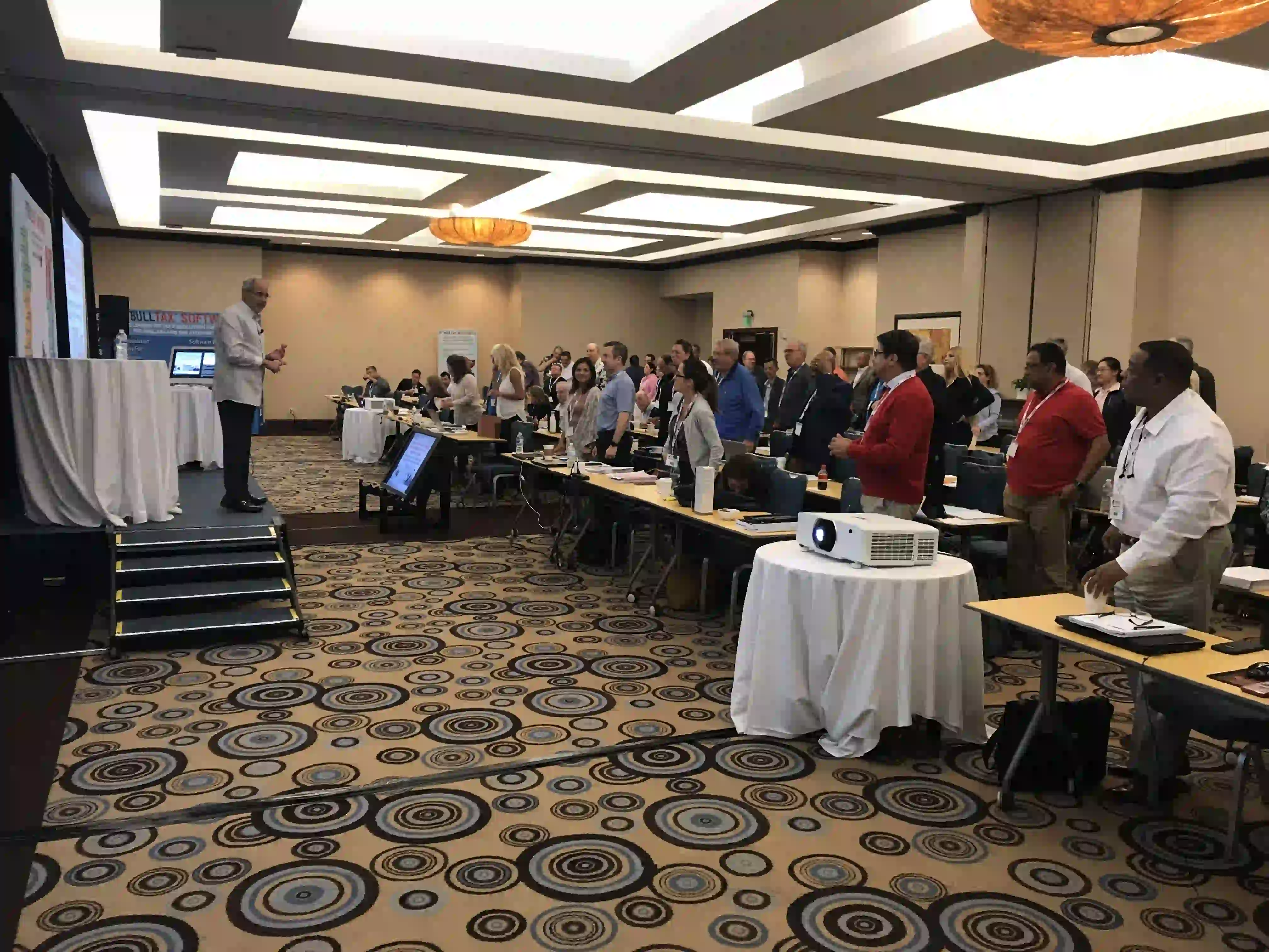 Several pictures of previous tax resolution conferences