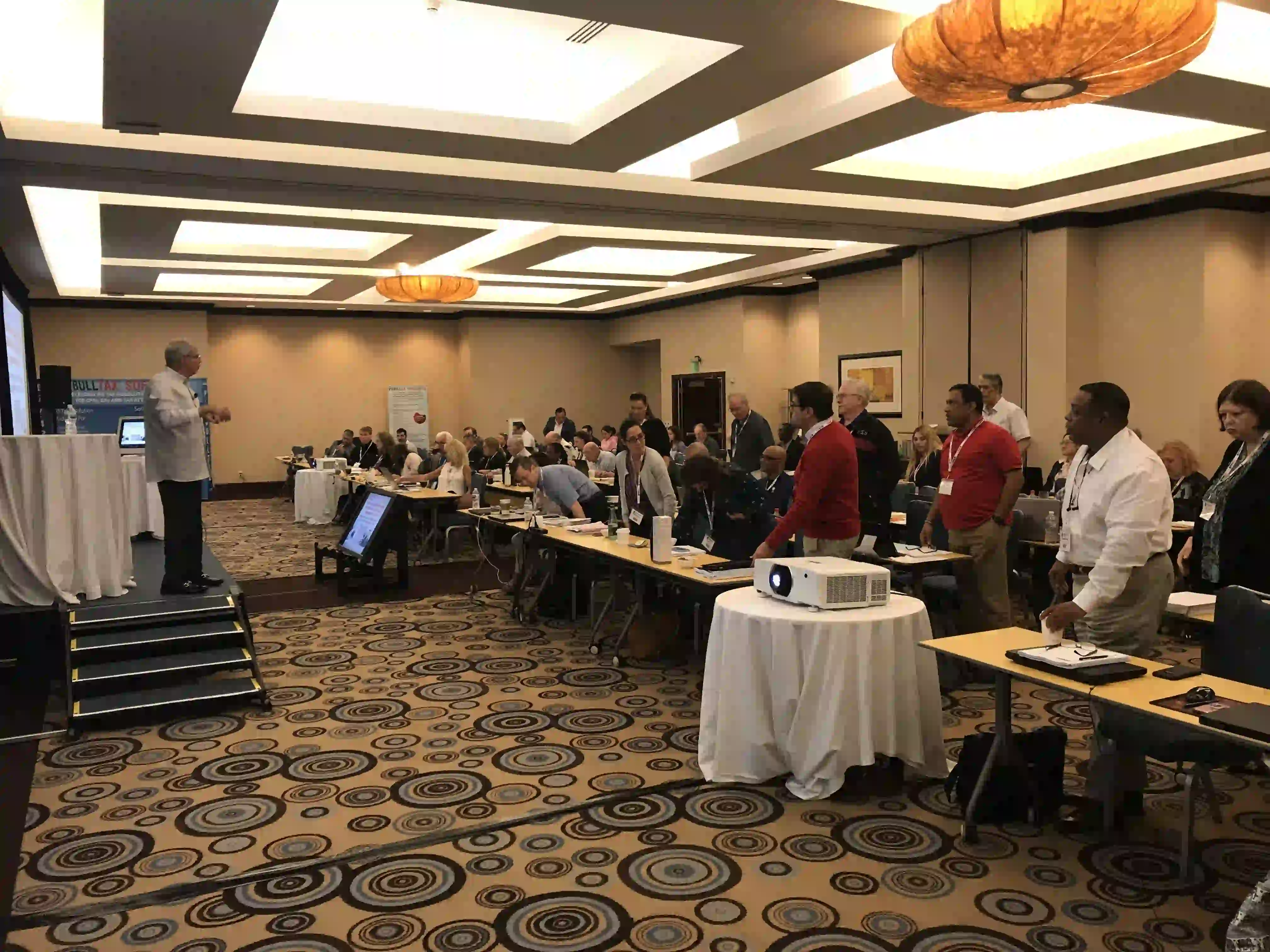 Several pictures of previous tax resolution conferences