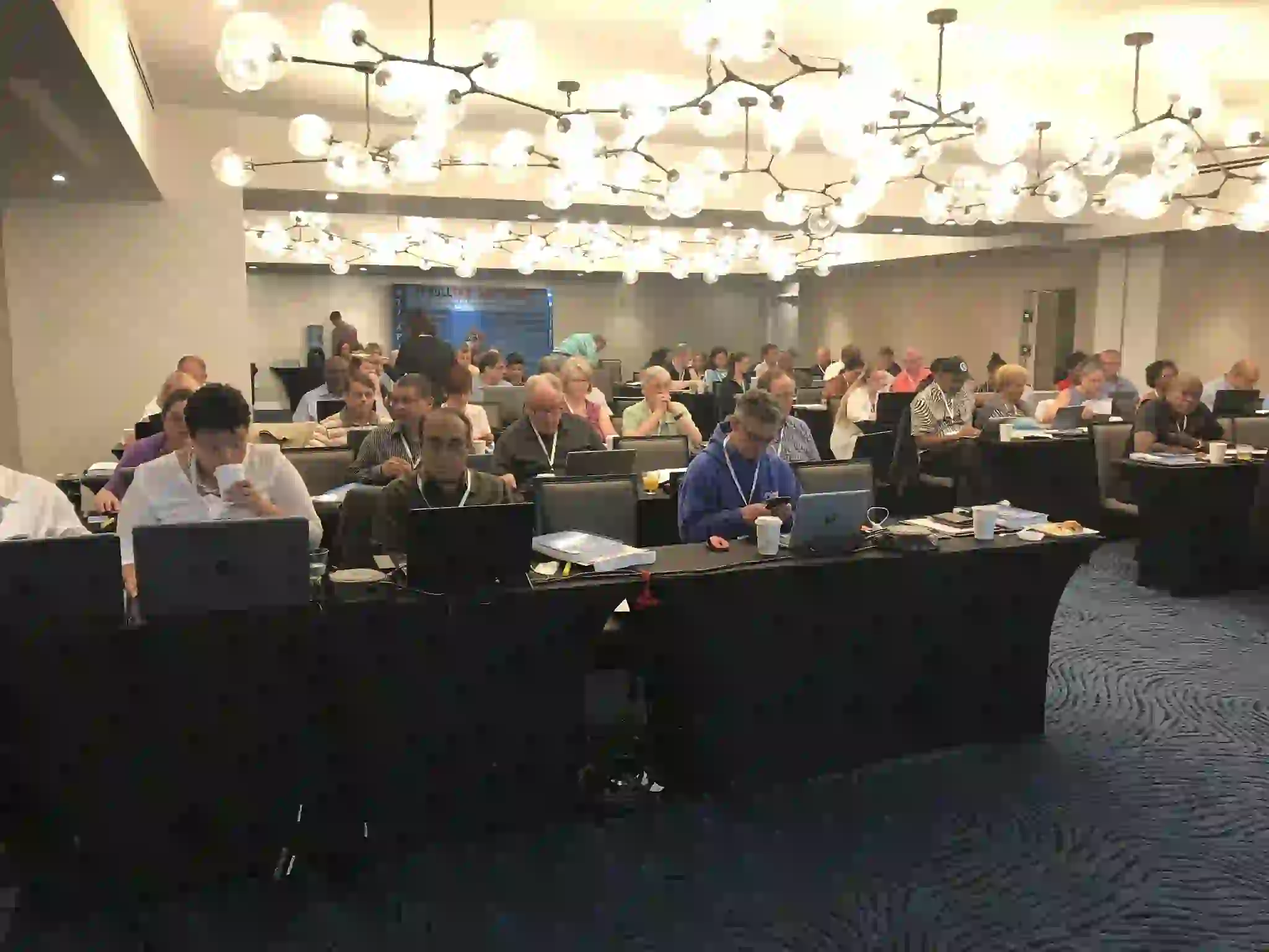 Several pictures of previous tax resolution conferences