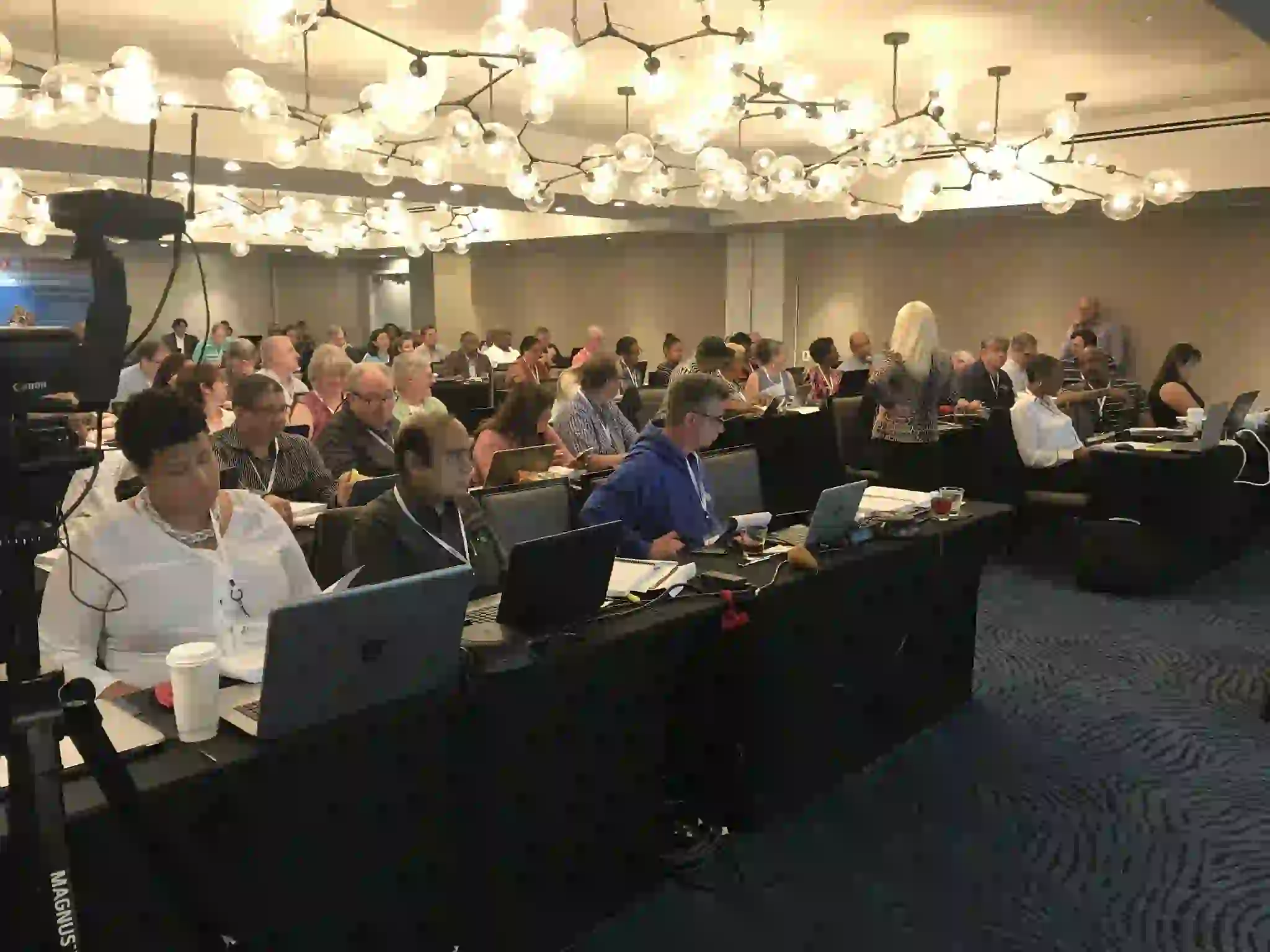 Several pictures of previous tax resolution conferences