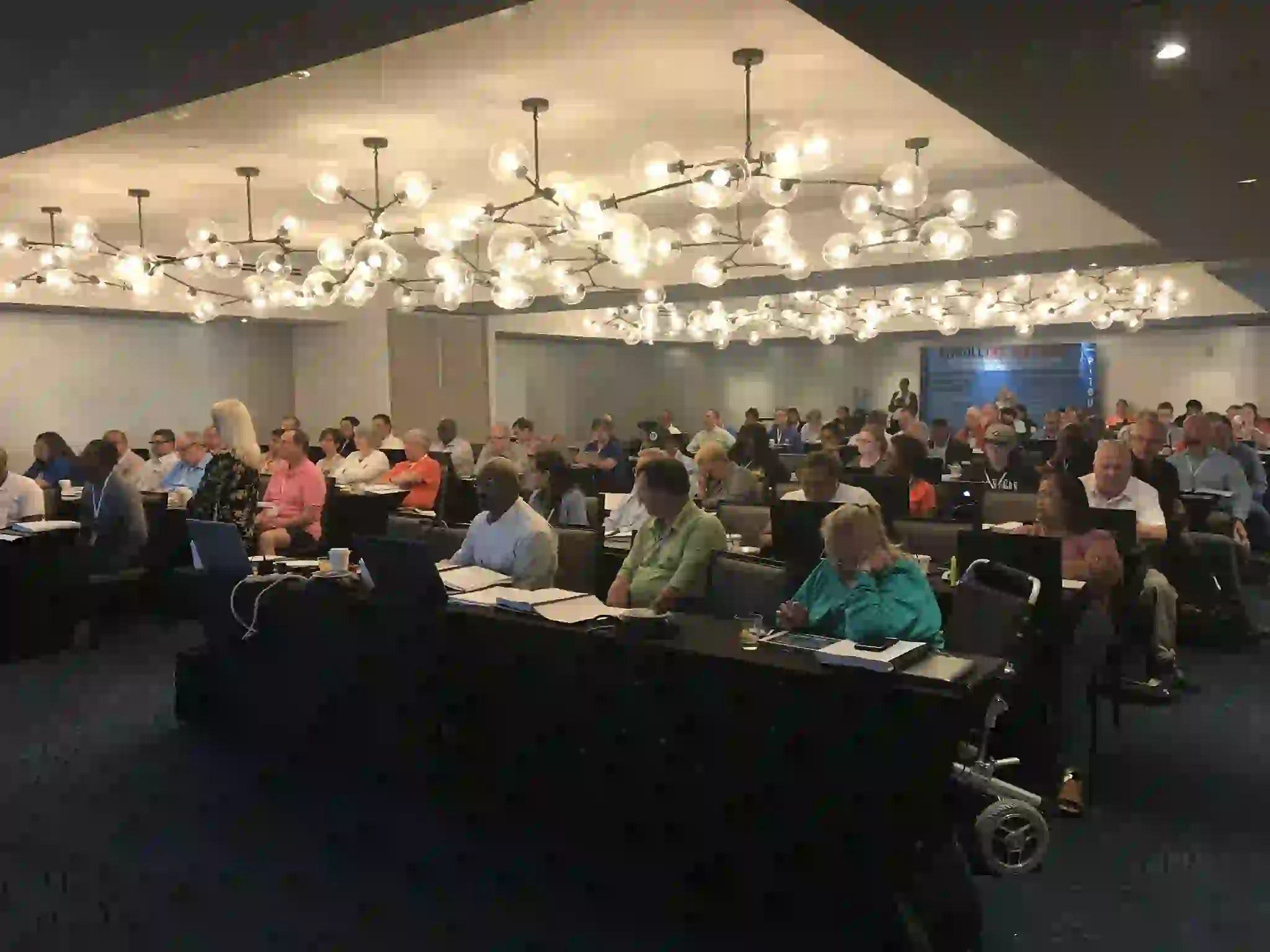 Several pictures of previous tax resolution conferences