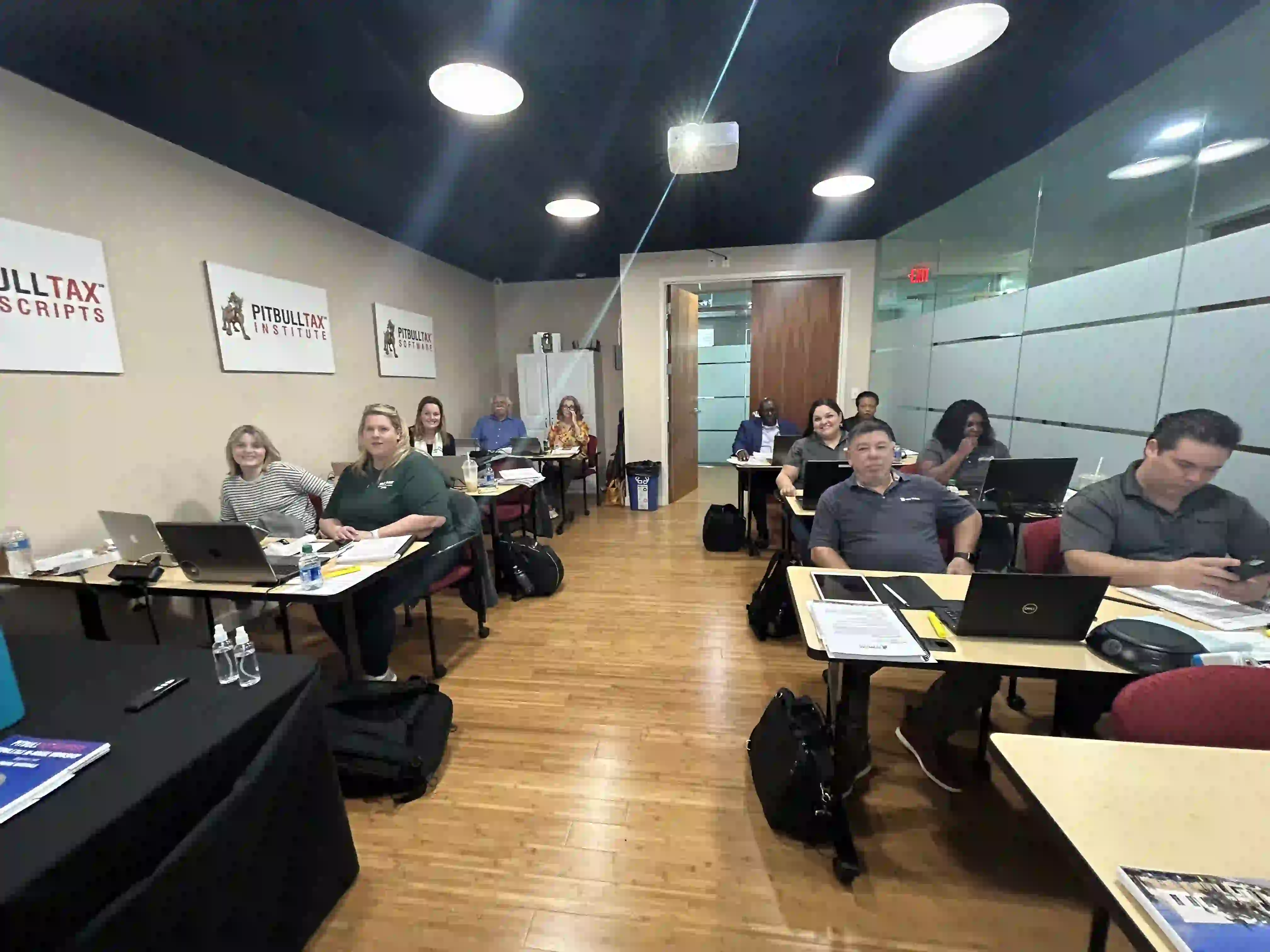 Several pictures of previous tax resolution workshops